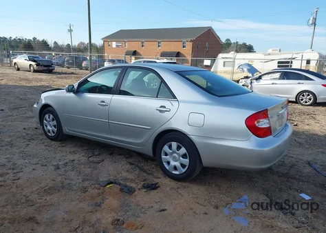 2002 Toyota Camry Le z USA, uszkodzony, nr VIN 4T1BE32K52U527663